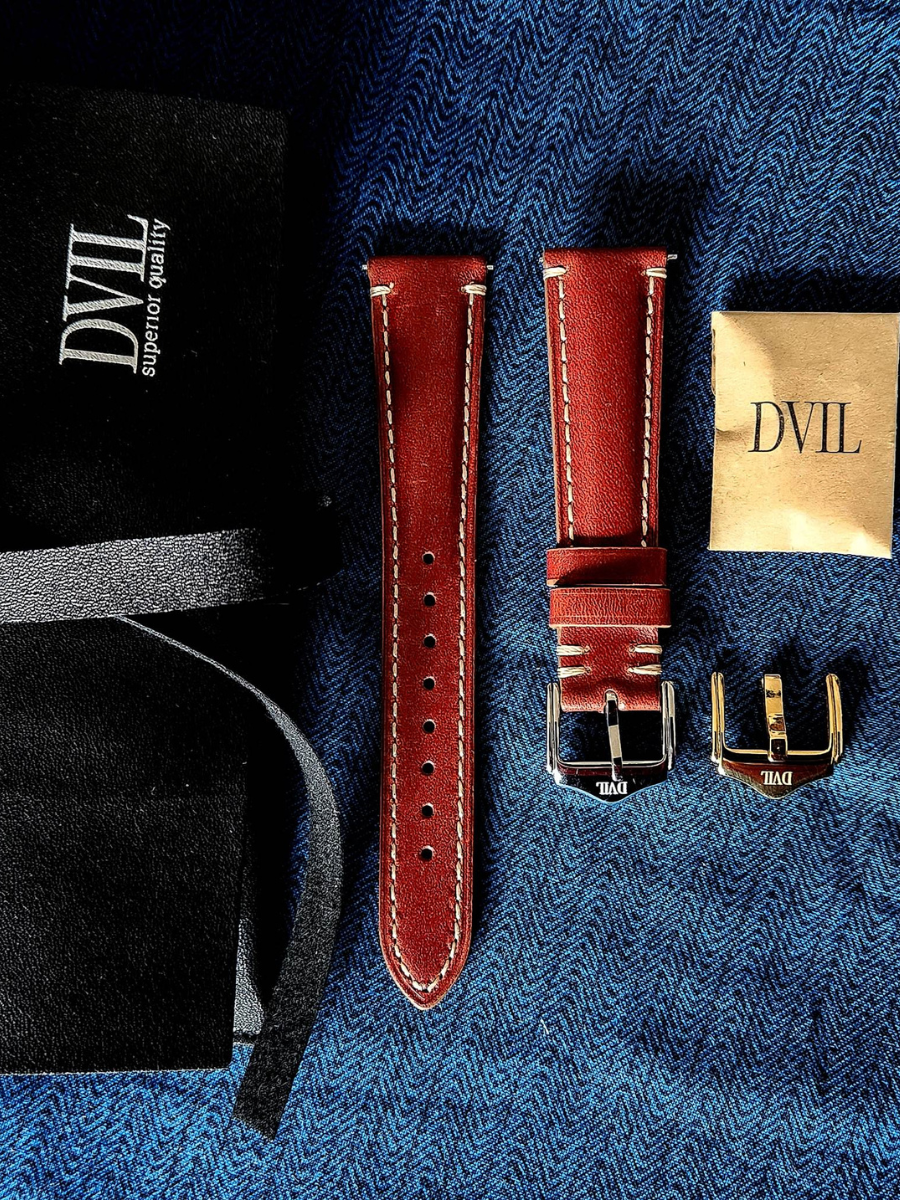 Red leather strap with DVIL presentation kit