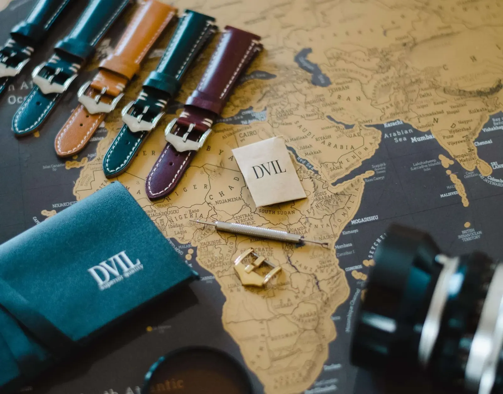 Handmade leather watch straps by DVIL Flat-lay of handmade DVIL leather watch straps in assorted colours